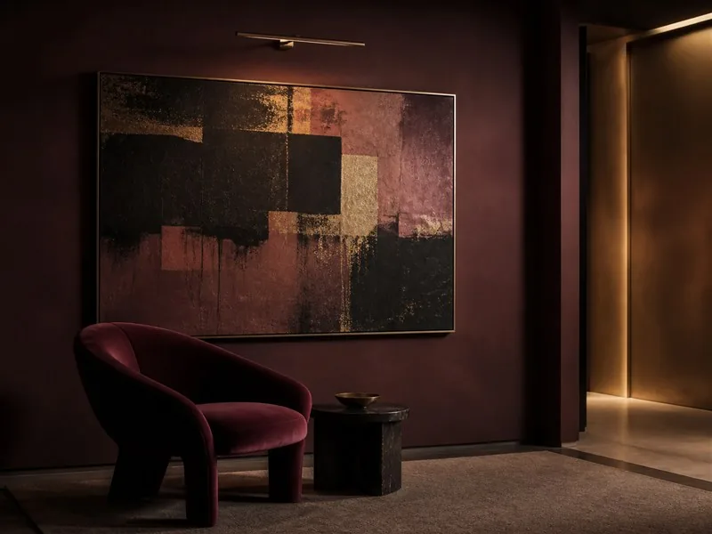 Private art gallery lounge in deep wine and gold tones